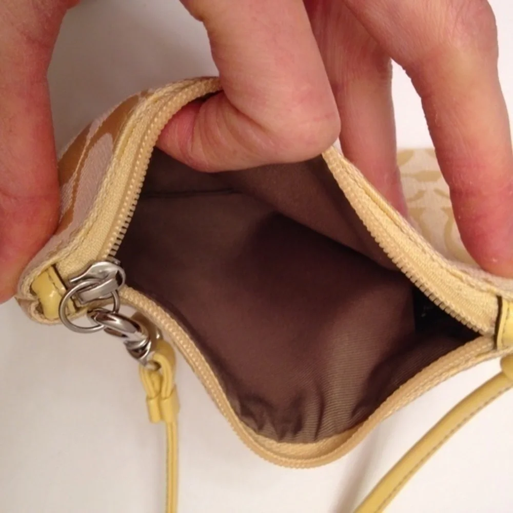 Coach yellow signature C wristlet Jacquard